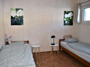 Ένα ή περισσότερα κρεβάτια σε δωμάτιο στο Bungalow House Lammersdorf