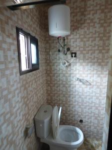 Ένα μπάνιο στο STUDIO 2 Climatisé et Ventilateur Plafonnier et WIFI GRATUIT A 6 NUITEES DE RESERVATION