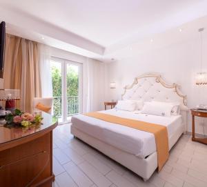 Postel nebo postele na pokoji v ubytování Ludwig Boutique Hotel & Spa