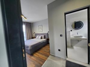 Postel nebo postele na pokoji v ubytování Villa Felicity + 16 fotografií