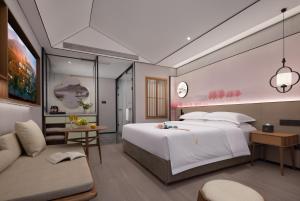 Gallery image of hanghzou moshangqingya hotel in Libu