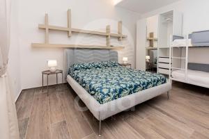 Кровать или кровати в номере Villa Giada - Mini Piscina con Idromassaggio By Cala Salento