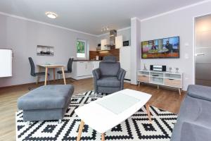 Kuchyň nebo kuchyňský kout v ubytování Ferienwohnungen im Haus Seeperle