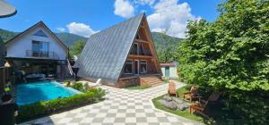 Bazén v ubytování Trigon Villa Family , HOT POOL ,SAUNA,JACUZZI nebo v jeho okolí