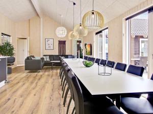 a large room with a long table and chairs at 5 star holiday home in Kappeln in Kappeln
