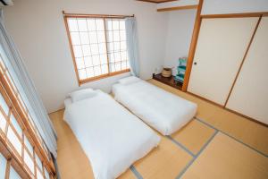 Ένα ή περισσότερα κρεβάτια σε δωμάτιο στο Bright house