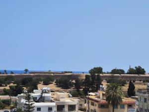 a view of a city with houses and trees at Şadan City Inn in Famagusta +21 photos