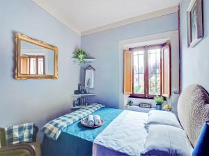 Postel nebo postele na pokoji v ubytování Belvilla by Oyo Villa Letizia