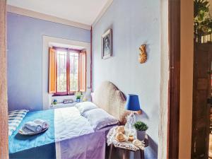 Postel nebo postele na pokoji v ubytování Belvilla by Oyo Villa Letizia