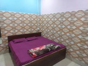 Postel nebo postele na pokoji v ubytování Annu Bhai Sewa Sadan