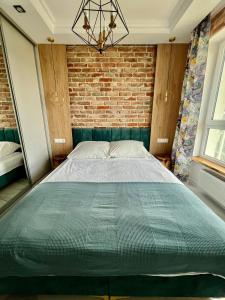 Postel nebo postele na pokoji v ubytování EASY RENT Apartments - Kompozytorów Polskich 7 Style, 24h Check-in + 20 fotografií