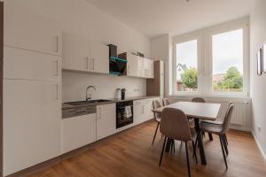 Dapur atau dapur kecil di WeserQuartier Apartment 4 +17 gambar
