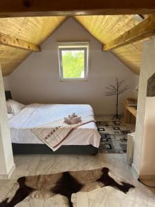 a bedroom with a bed and a window at Mia Hill House Nemenikuce in Nemenikuće +54 photos