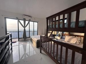 Un pat sau paturi într-o cameră la Verdadero Norte Beach Resort +76 fotografii