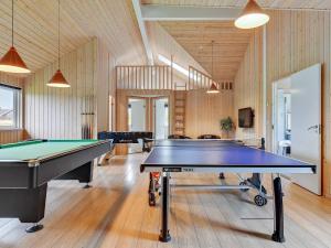 a large room with a pool table in it at Luxury Retreat with Pool - By Traum Ferienwohnungen in Høruphav