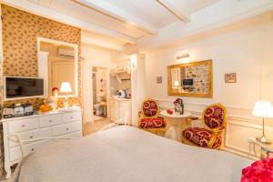 Ein Bett oder Betten in einem Zimmer der Unterkunft Villa Segalla