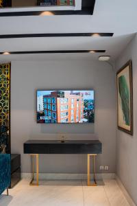 TV a/nebo společenská místnost v ubytování The Orchard Boutique Hotel