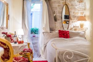 Ein Bett oder Betten in einem Zimmer der Unterkunft Villa Segalla