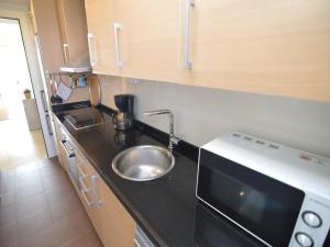 Η κουζίνα ή μικρή κουζίνα στο Golfside Luxury at Las Colinas +32 φωτογραφίες