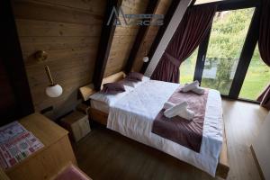 Postel nebo postele na pokoji v ubytování Cabanele Marcus