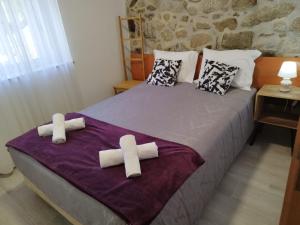 Ένα ή περισσότερα κρεβάτια σε δωμάτιο στο Casa do Corgo