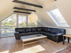 Posezení v ubytování 8 person holiday home in Højslev-By Traum