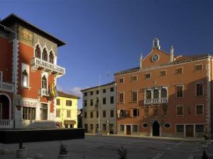 a group of buildings on a city street at Holiday Home in Vodnjan near the Sea in Vodnjan