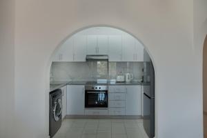 Kuchyň nebo kuchyňský kout v ubytování Phaedrus Living Golden Seaview Residence