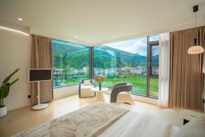 Nespecifikovaný výhled na hory nebo výhled na hory při pohledu z aparthotelu + 50 fotografií