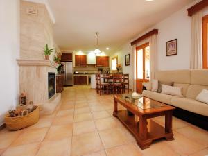 a living room with a couch and a table at Villa in Mallorca with Private Pool in Marratxi +32 photos