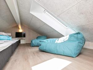 a room with two bean bags in a attic at Luxury Retreat in Marielyst - By Traum Ferienwohnungen in Marielyst