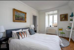 Katil atau katil-katil dalam bilik di Home in Old Town with stunning views