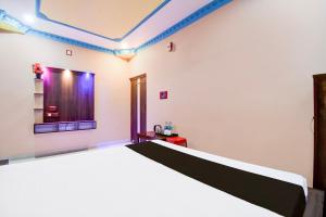 Postel nebo postele na pokoji v ubytování Hotel O MANTRA + 24 fotografií