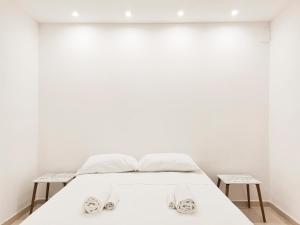 Ένα ή περισσότερα κρεβάτια σε δωμάτιο στο Rogadeo34