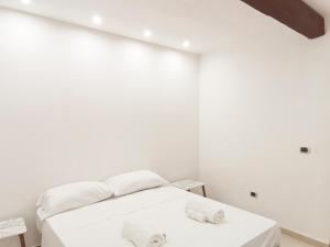 Ένα ή περισσότερα κρεβάτια σε δωμάτιο στο Rogadeo34