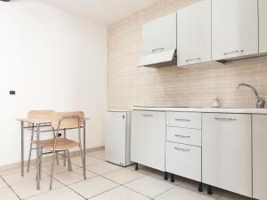 Η κουζίνα ή μικρή κουζίνα στο Rogadeo34 +23 φωτογραφίες