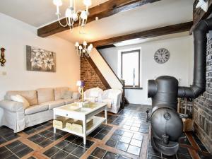 Posezení v ubytování Luxury Pool Villa in Goesnes + 32 fotografií