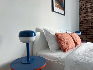 Ένα ή περισσότερα κρεβάτια σε δωμάτιο στο Ollio Balkan Escape