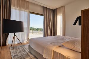 TV a/nebo společenská místnost v ubytování Taria Resort