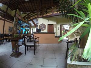 Um restaurante ou outro lugar para comer em Recanto Verde Praia Hotel Juquehy