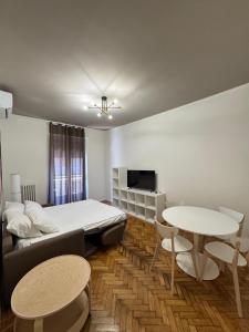TV a/nebo společenská místnost v ubytování VEGA RIBBON