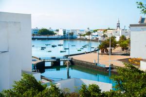 a view of a marina with boats in the water at Hostal España in Arrecife