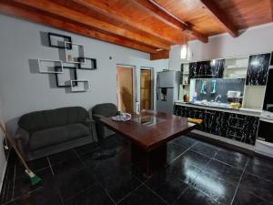 Kuchyň nebo kuchyňský kout v ubytování Hospedaje Diego Fabián