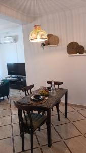 TV a/nebo společenská místnost v ubytování location appartement F4 + 5 fotografií