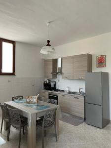 Kuchyň nebo kuchyňský kout v ubytování Nello House