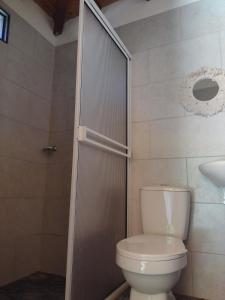 Koupelna v ubytování Monteverde + 19 fotografií