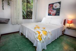 Postel nebo postele na pokoji v ubytování Villas Jacquelina