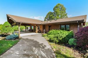 a brick building with a gambrel roof at Dakota Ridge in Butler