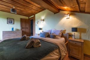 Postel nebo postele na pokoji v ubytování Chalet Harmony, Liézey - Gérardmer 9p - Spa