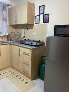 Η κουζίνα ή μικρή κουζίνα στο Zuri Homes